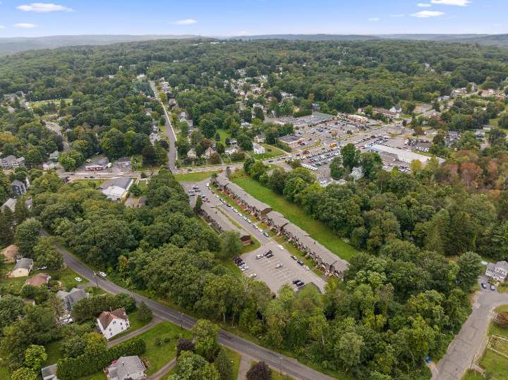 Aerial view toward the pond and hills
