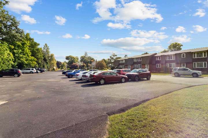 Resident parking area beside the buildings